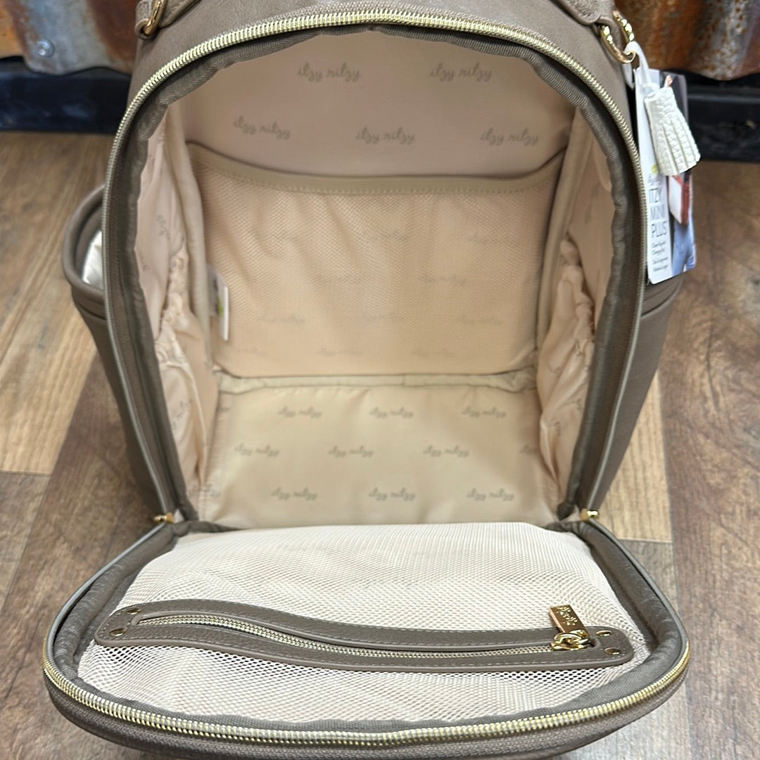 Vanilla latte Itzy Ritzy diaper bag with changing pad