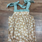 Tan floral ruffle tie bubble