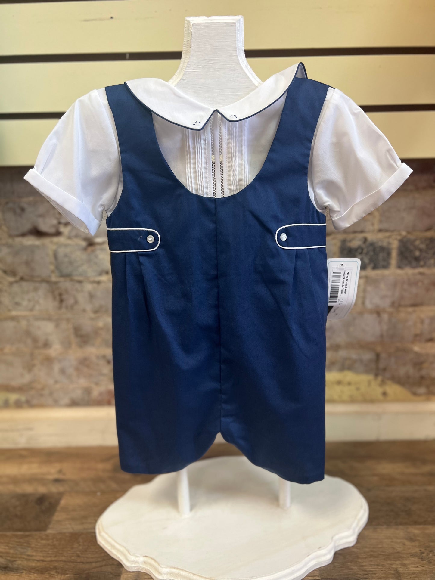 Navy Shortall with pintucks and side tabs