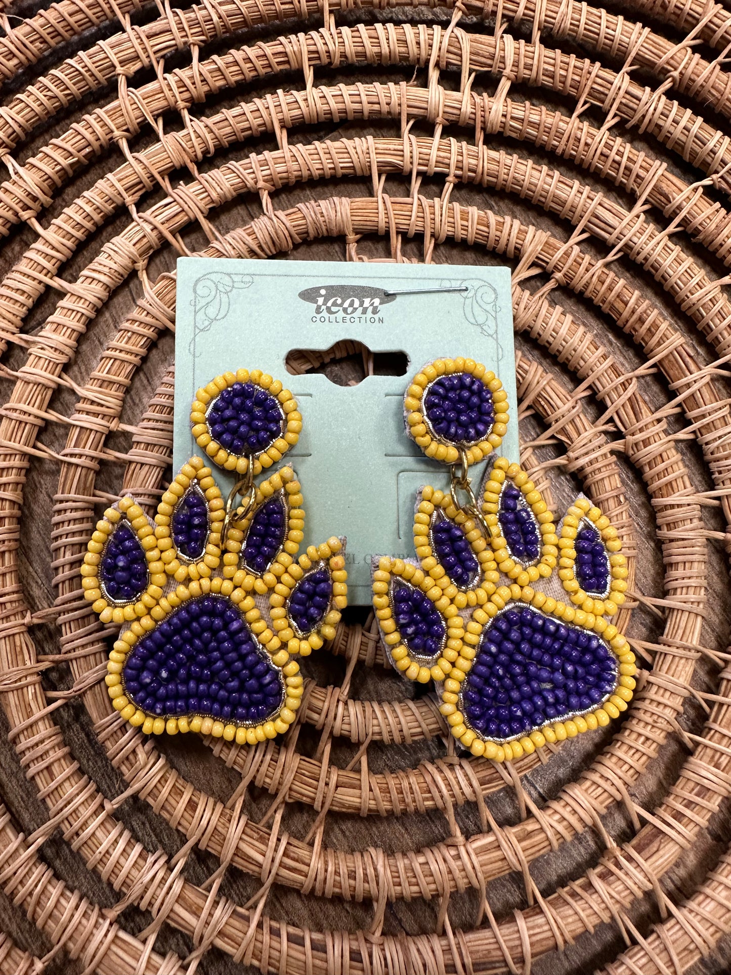 Purple/gold paw print beaded earrings